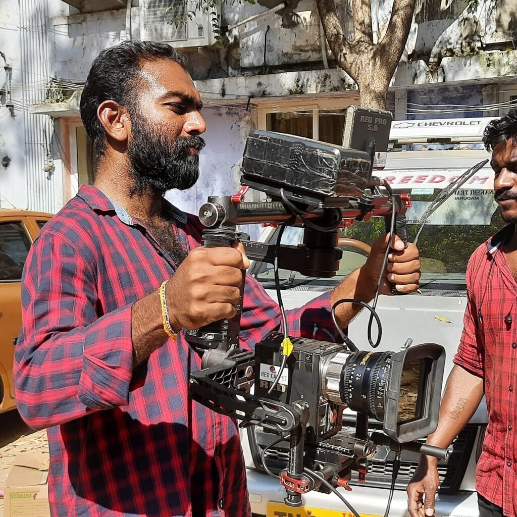Cinematographer operating a digital cinema camera
